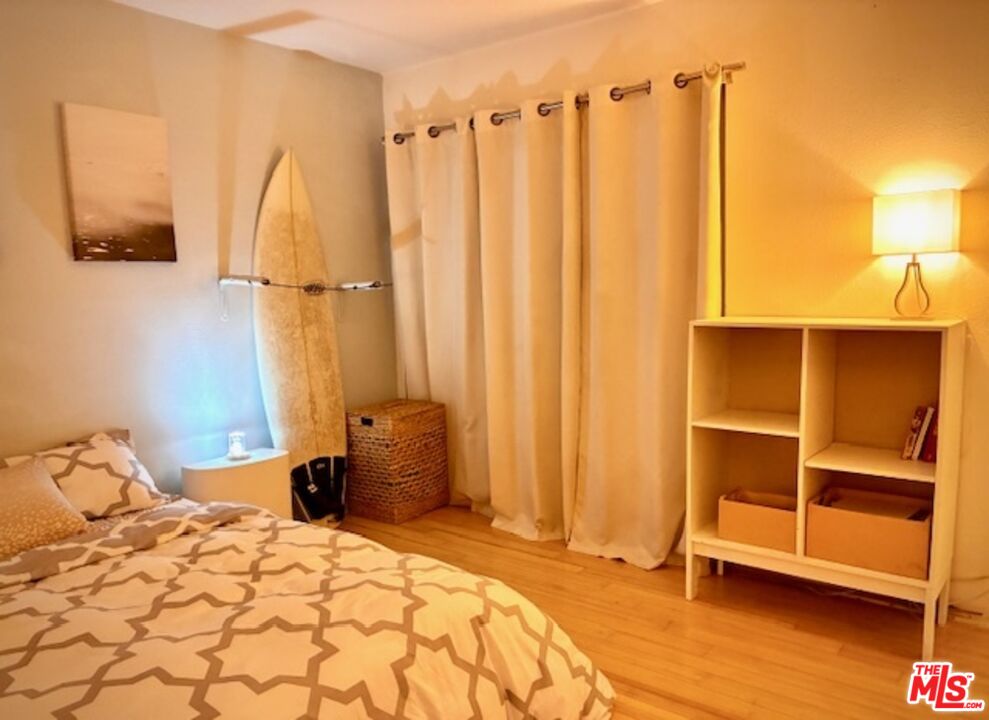 7740 Redlands Street, Unit G1098 Playa del Rey, CA 90293 - Photo 17 of 35 a bedroom with a bed and a cabinets
