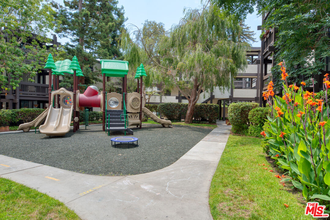 7740 Redlands Street, Unit G1098 Playa del Rey, CA 90293 - Photo 26 of 35 a view of a park with swings and slides