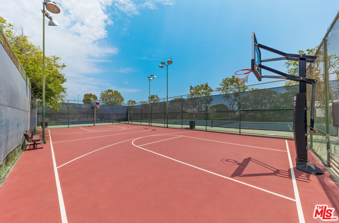 7740 Redlands Street, Unit G1098 Playa del Rey, CA 90293 - Photo 27 of 35 a view of a tennis court with a basket ball court
