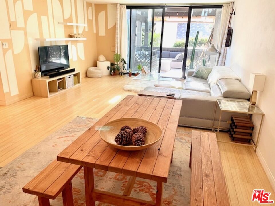 7740 Redlands Street, Unit G1098 Playa del Rey, CA 90293 - Photo 5 of 35 a living room with furniture and a flat screen tv
