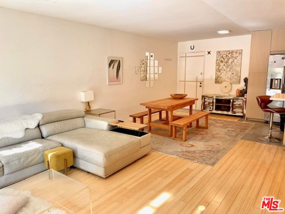 7740 Redlands Street, Unit G1098 Playa del Rey, CA 90293 - Photo 6 of 35 a living room with furniture and a table