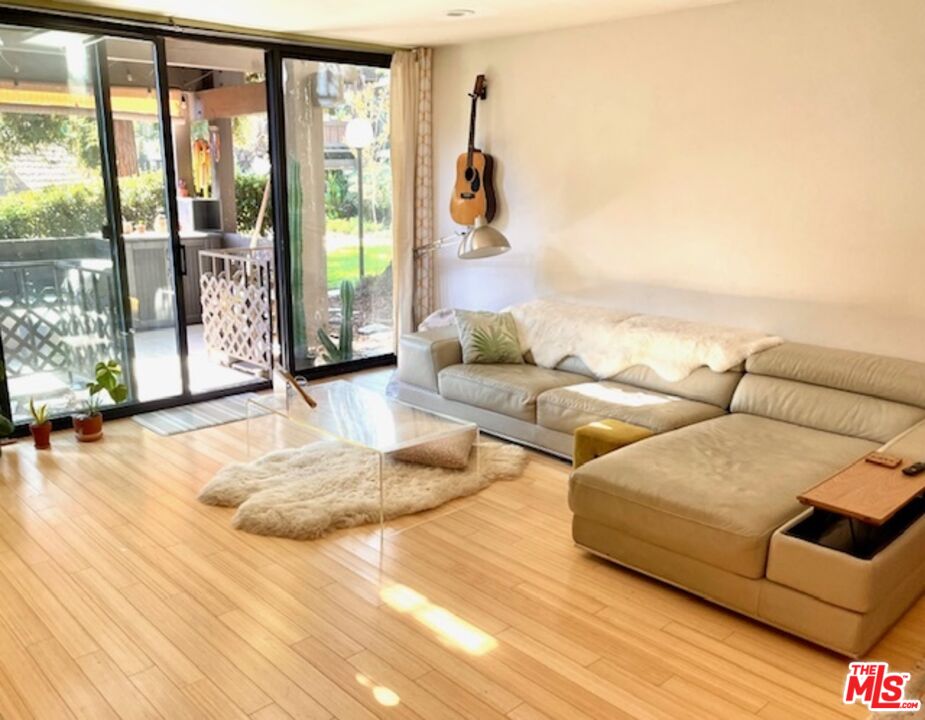 7740 Redlands Street, Unit G1098 Playa del Rey, CA 90293 - Photo 9 of 35 a living room with furniture and a large window