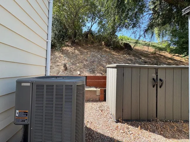 a view of a back yard of the house
