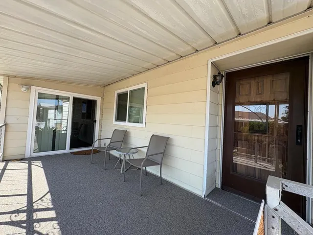 a view of house with patio outdoor seating