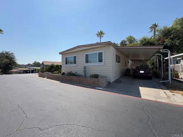 a front view of a house with a porch