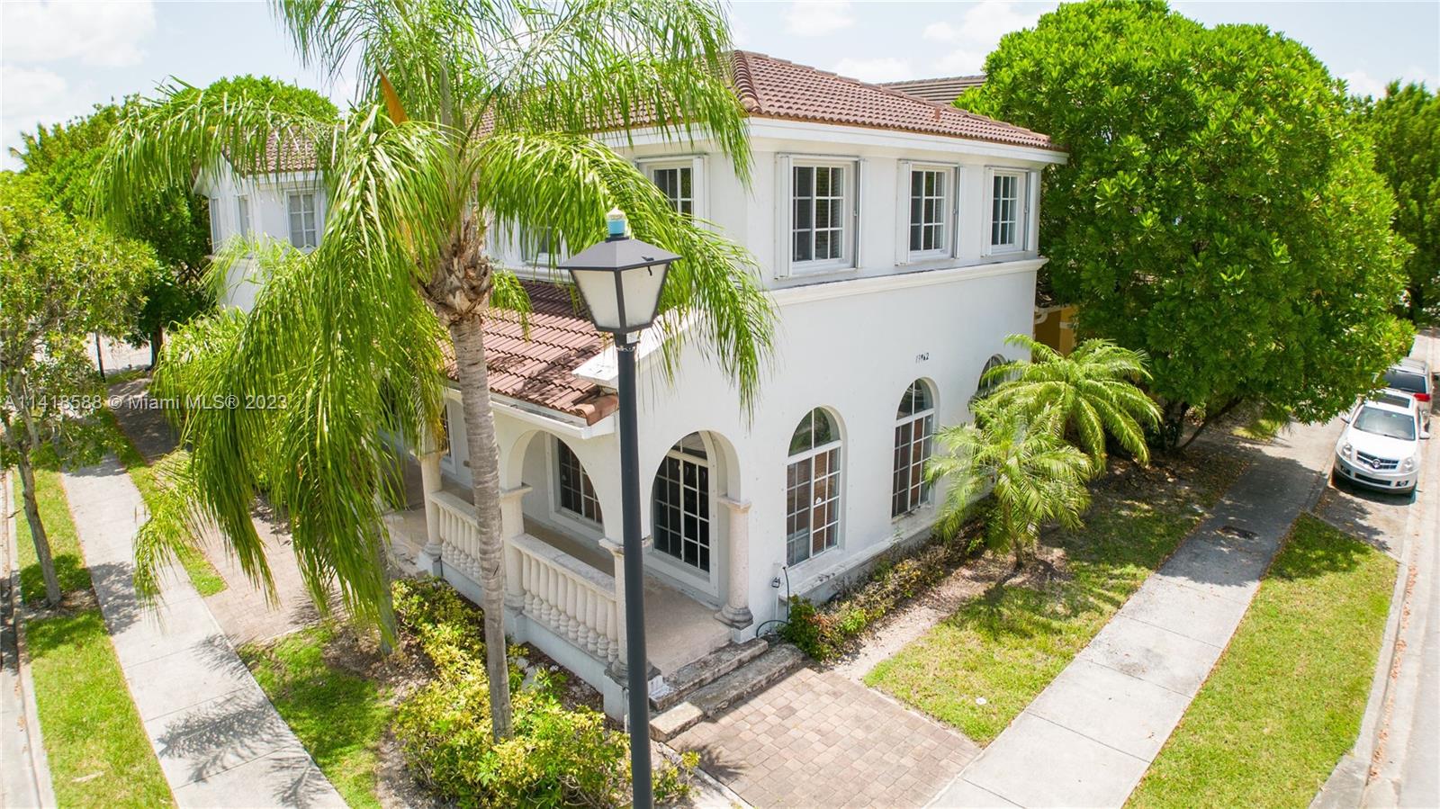 13962 Southwest 278th Street Homestead, FL 33032 - Photo 2 of 45 a view of a house with a yard