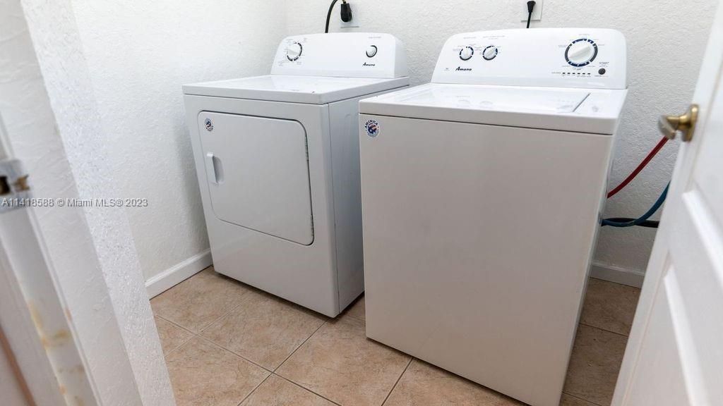13962 Southwest 278th Street Homestead, FL 33032 - Photo 39 of 45 a utility room with dryer and washer