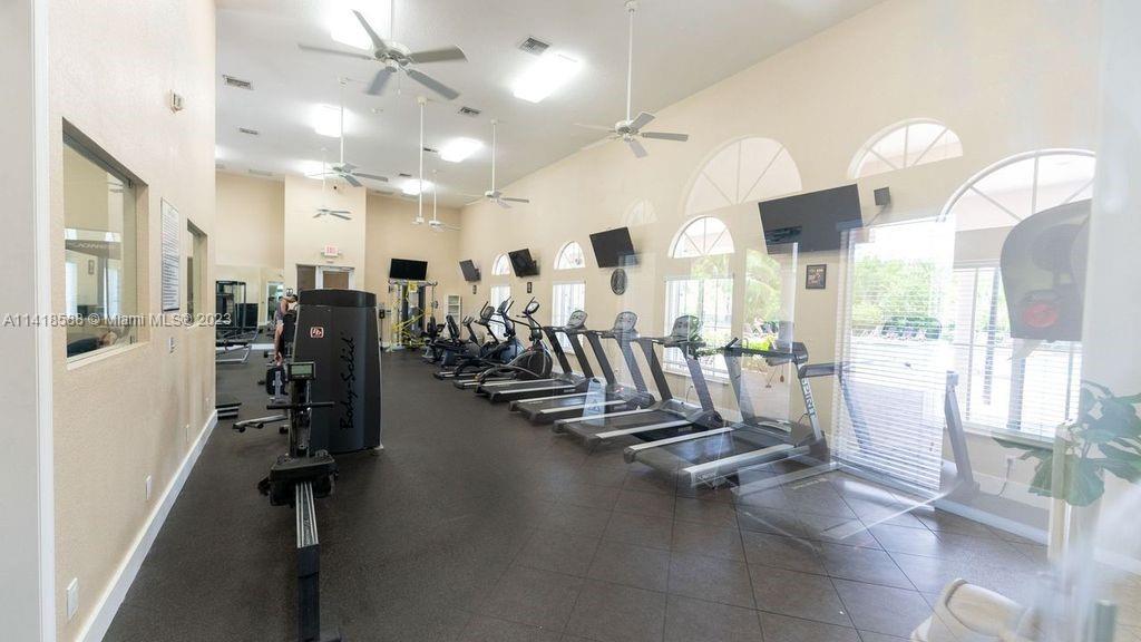 13962 Southwest 278th Street Homestead, FL 33032 - Photo 42 of 45 a view of a room with gym equipment