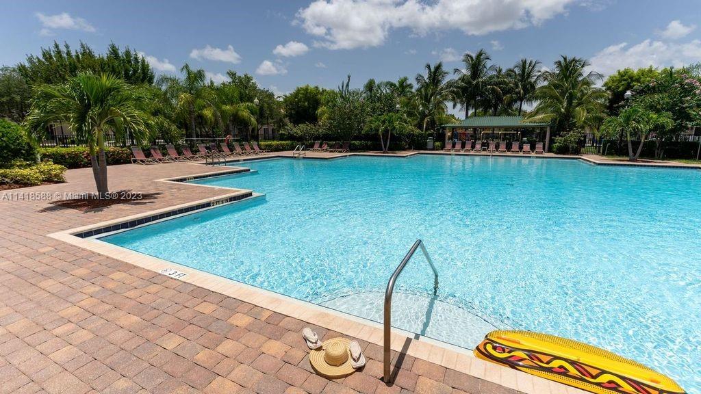 13962 Southwest 278th Street Homestead, FL 33032 - Photo 43 of 45 a view of swimming pool with chairs