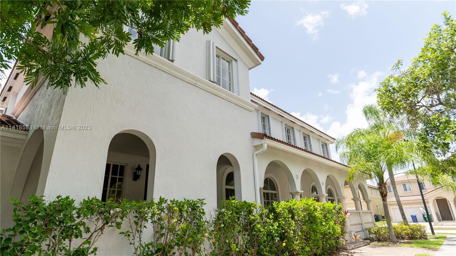 13962 Southwest 278th Street Homestead, FL 33032 - Photo 7 of 45 a front view of a house with a yard
