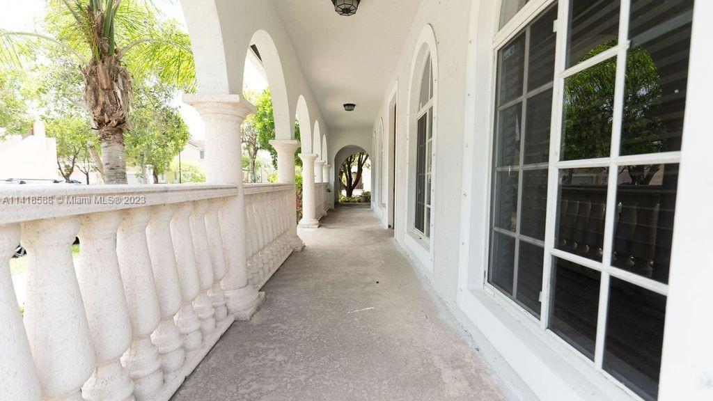 13962 Southwest 278th Street Homestead, FL 33032 - Photo 9 of 45 a view of a house with a porch
