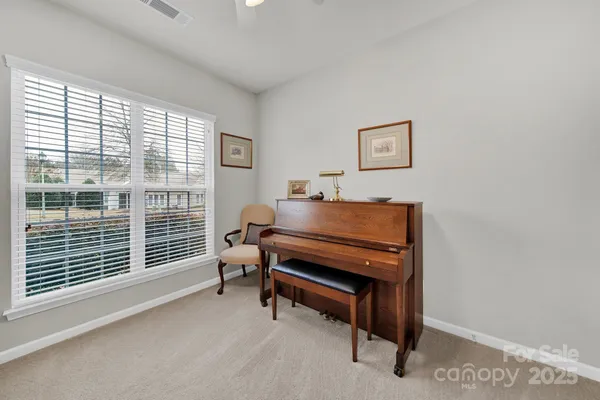 a room with furniture and a window