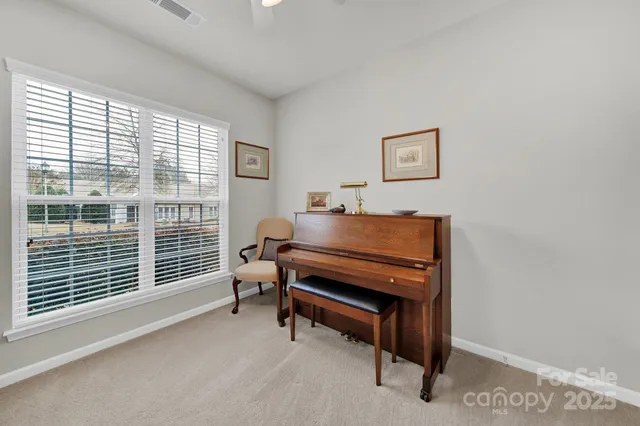 a room with furniture and a window
