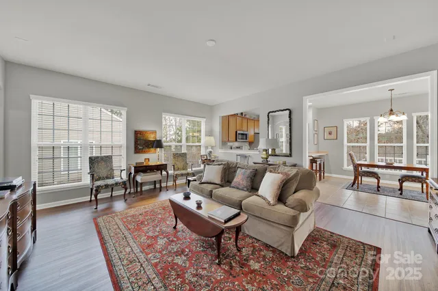 a living room with furniture and a table