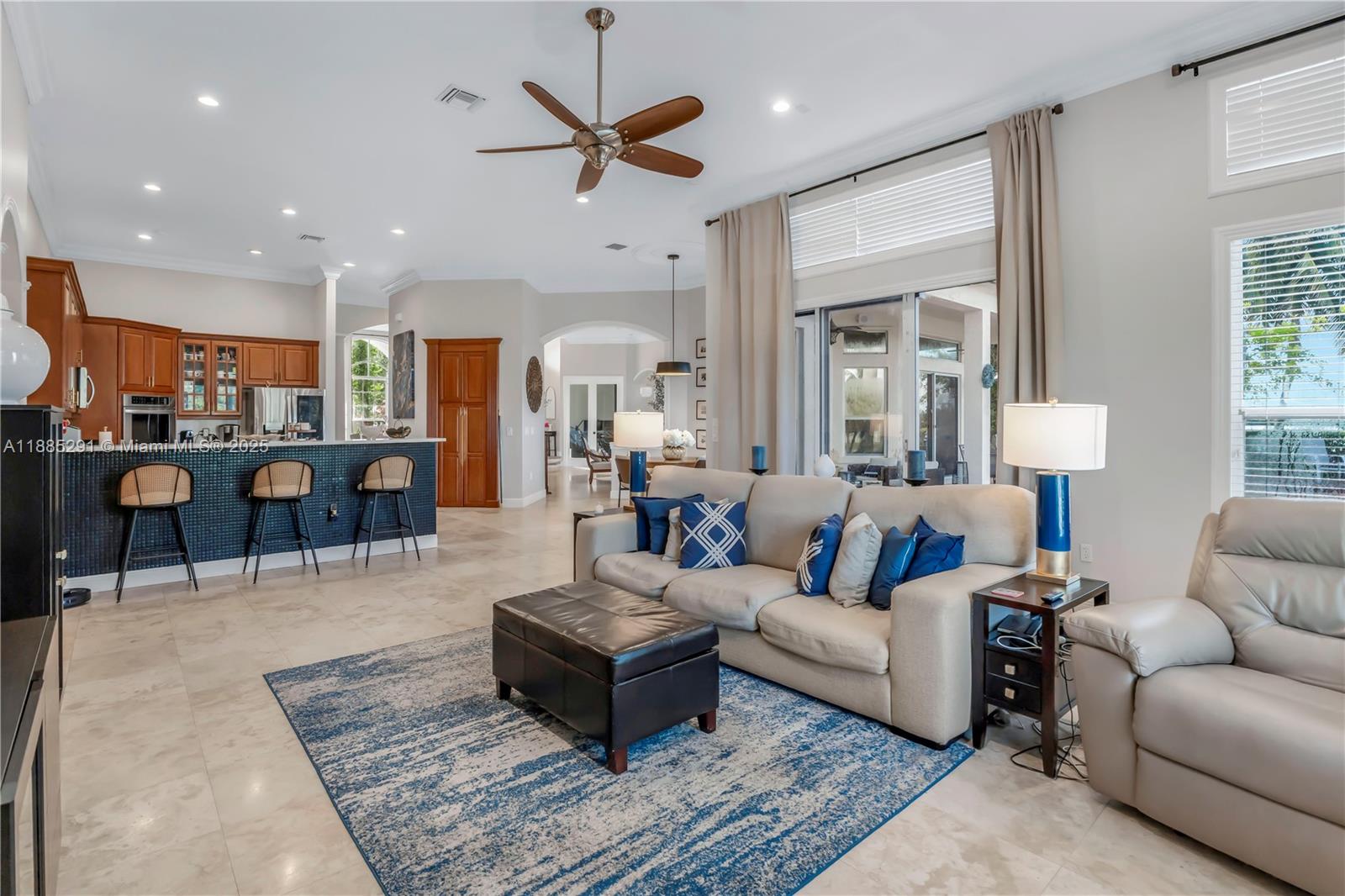 4166 Southwest 190th Avenue Miramar, FL 33029 - Photo 15 of 70 a living room with furniture and a view of kitchen