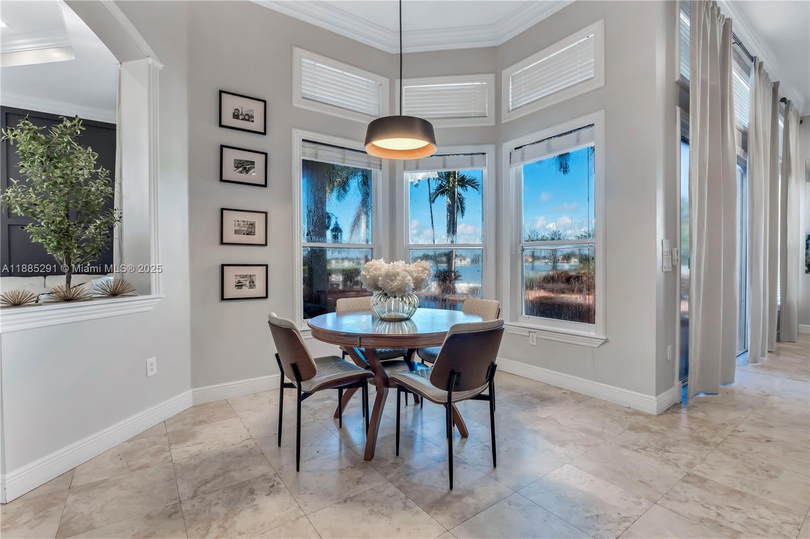 4166 Southwest 190th Avenue Miramar, FL 33029 - Photo 23 of 70 a dining room with furniture and window