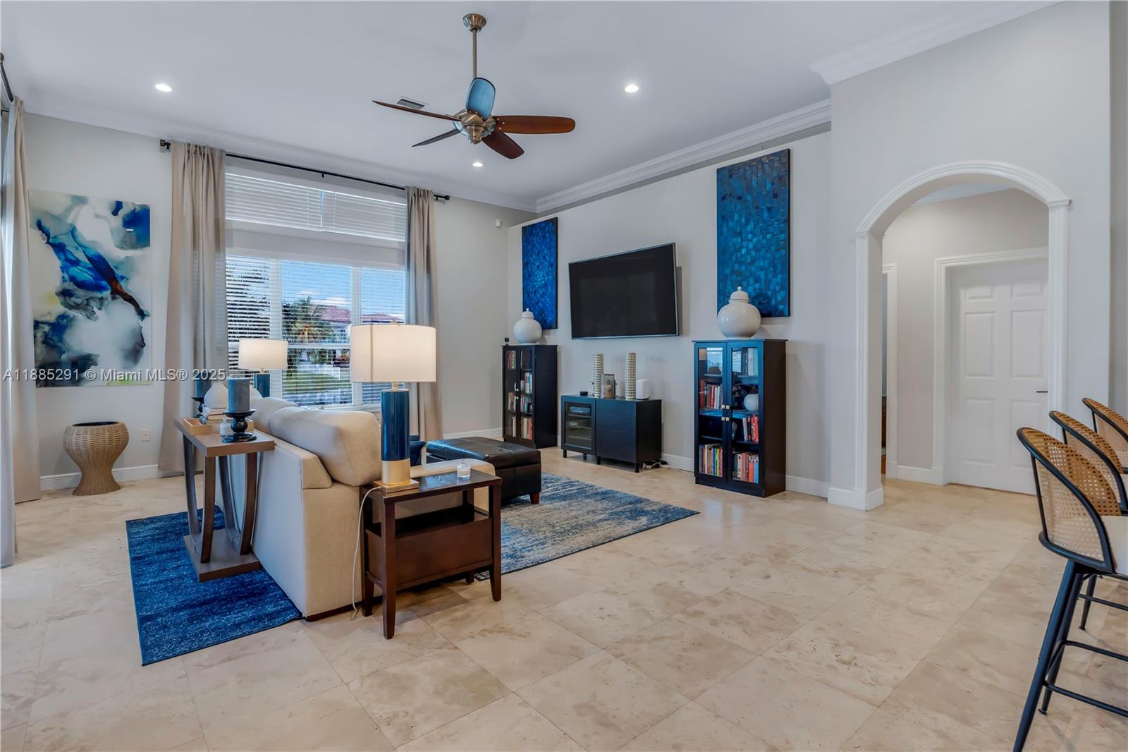 4166 Southwest 190th Avenue Miramar, FL 33029 - Photo 25 of 70 a living room with furniture and a flat screen tv
