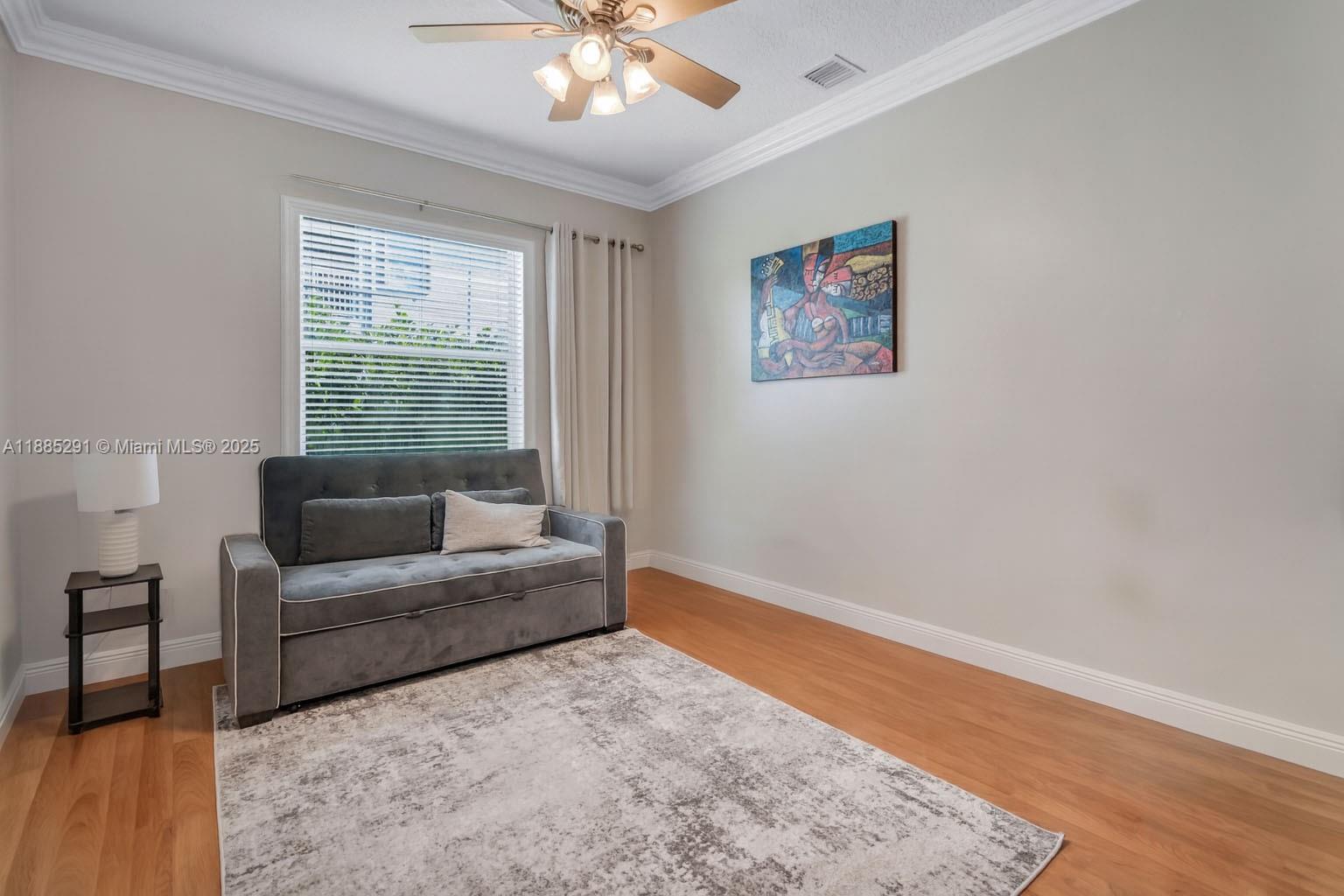 4166 Southwest 190th Avenue Miramar, FL 33029 - Photo 28 of 70 a living room with furniture and a window