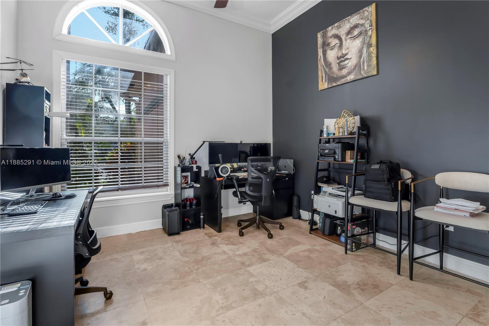 4166 Southwest 190th Avenue Miramar, FL 33029 - Photo 30 of 70 a view of a workspace with furniture and a window