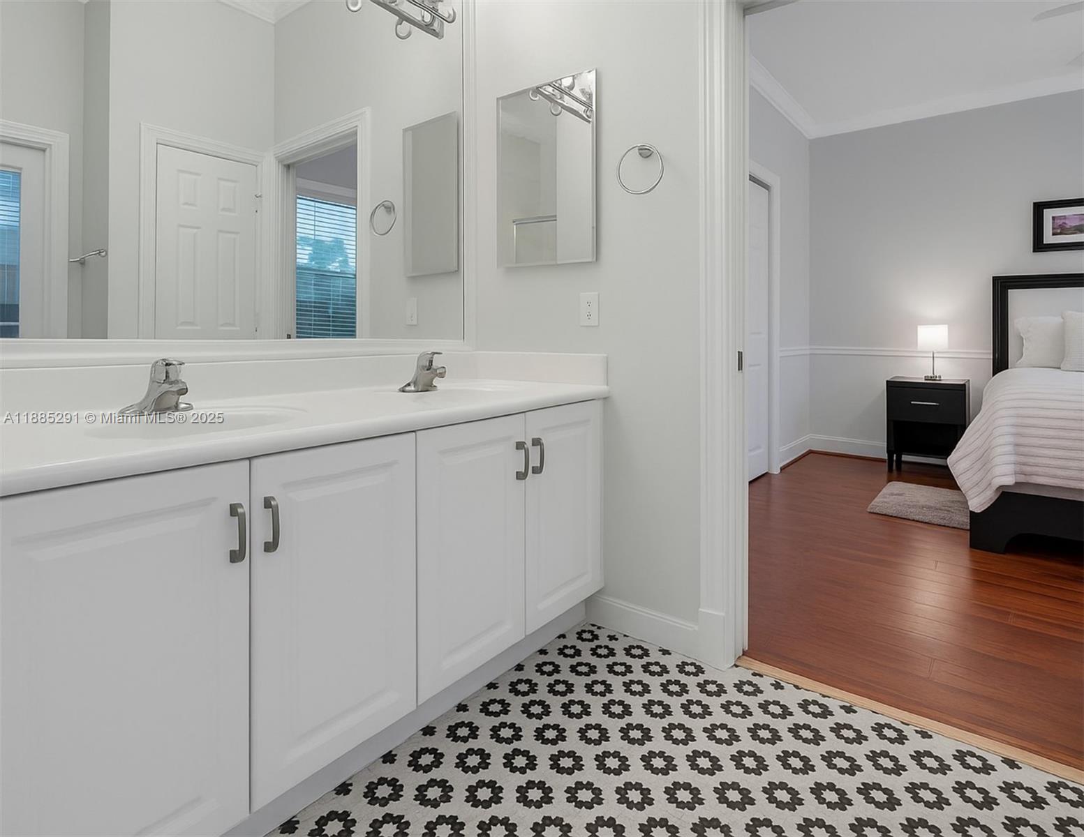 4166 Southwest 190th Avenue Miramar, FL 33029 - Photo 35 of 70 a living room with a bed and a walk in closet