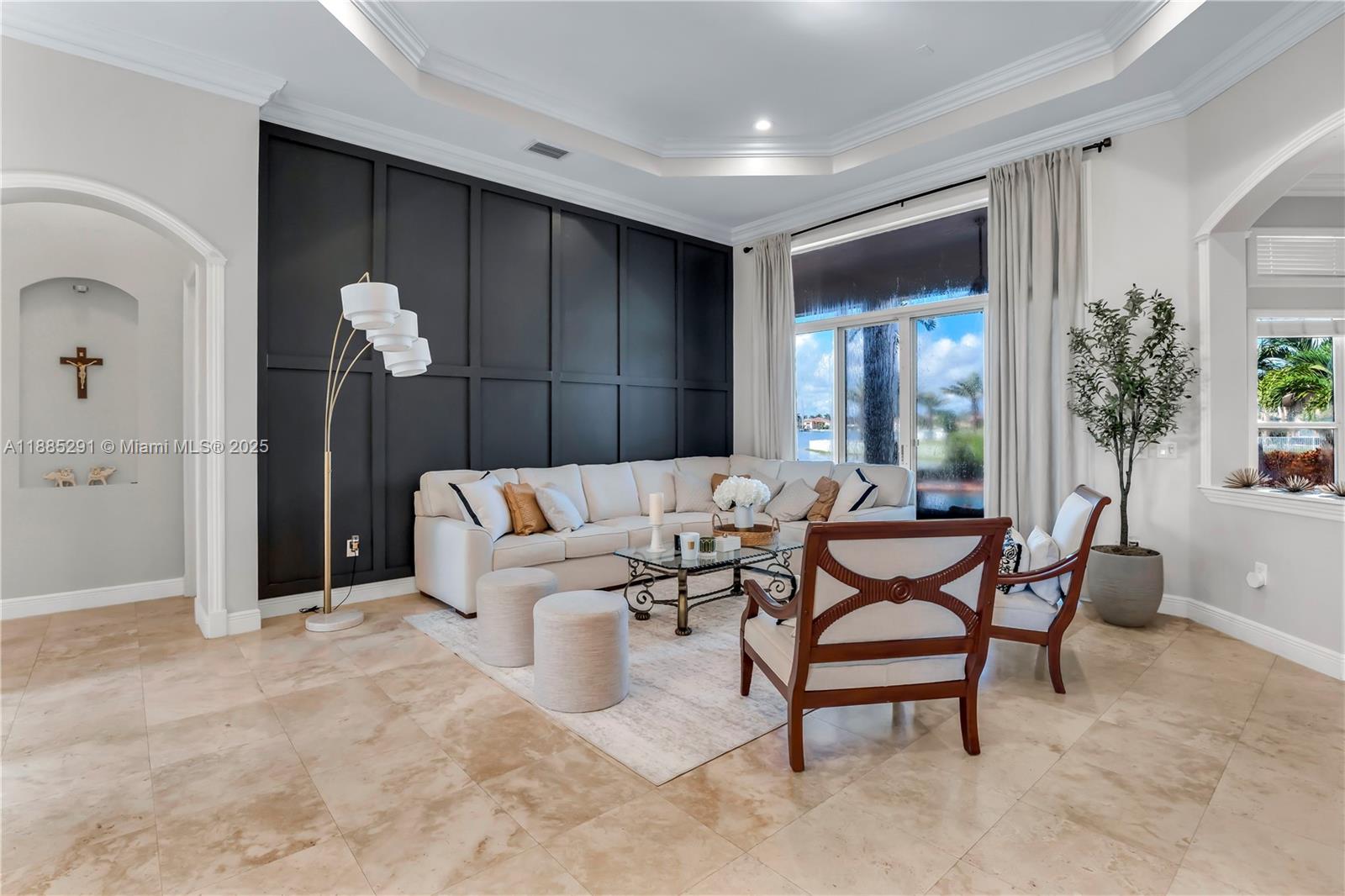 4166 Southwest 190th Avenue Miramar, FL 33029 - Photo 37 of 70 a living room with furniture and a potted plant
