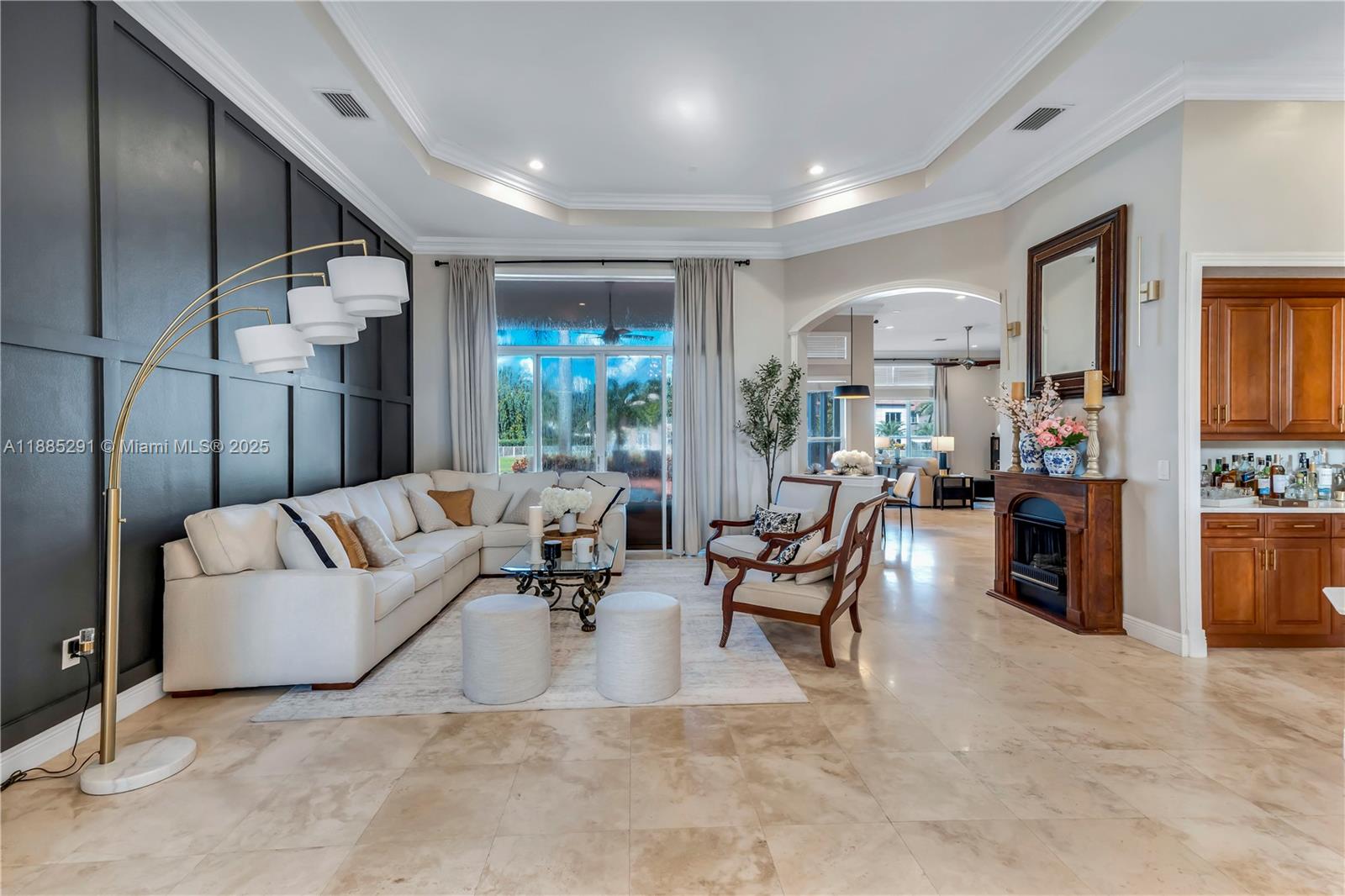 4166 Southwest 190th Avenue Miramar, FL 33029 - Photo 39 of 70 a living room with furniture and a flat screen tv
