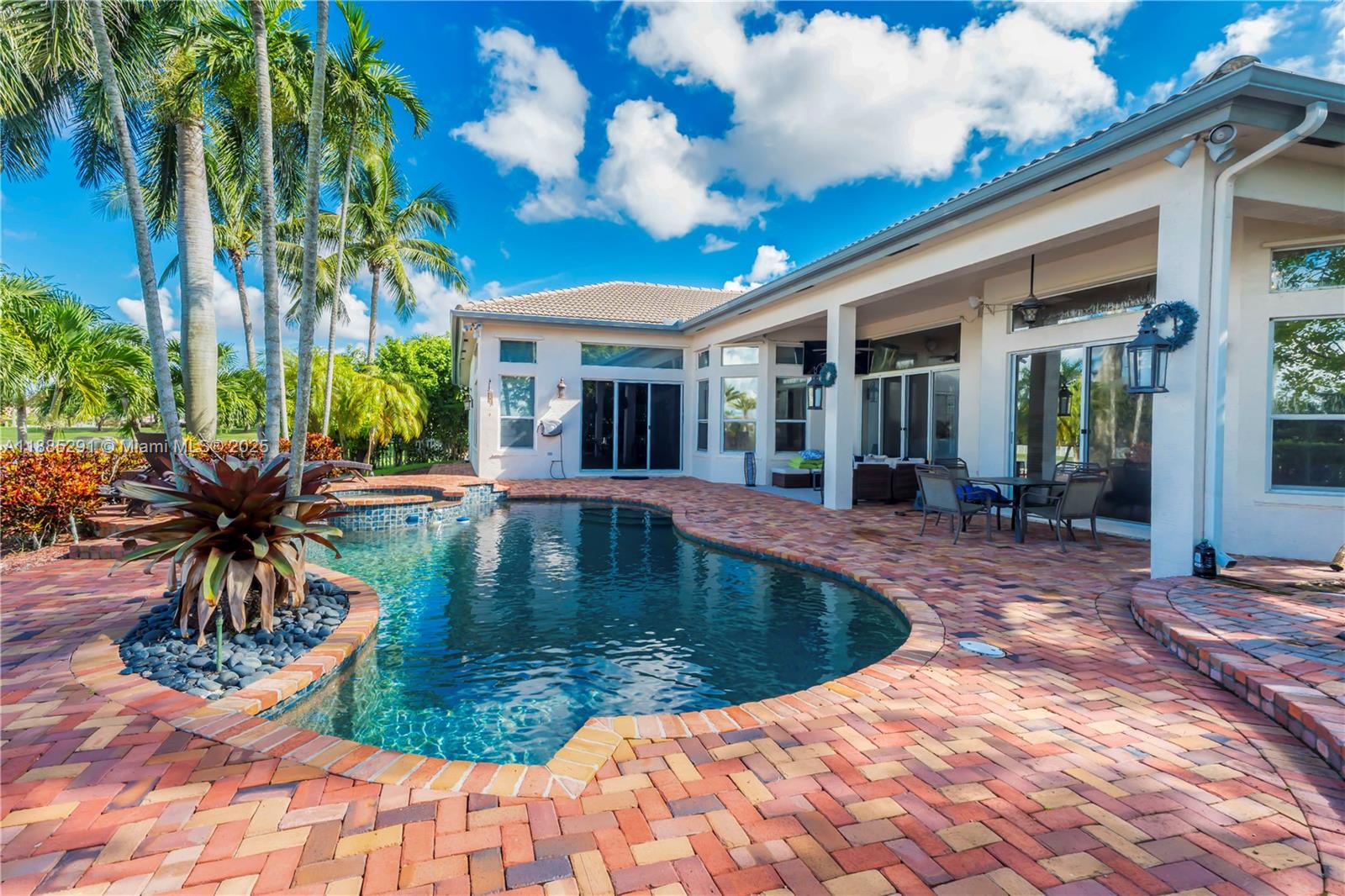 4166 Southwest 190th Avenue Miramar, FL 33029 - Photo 4 of 70 a view of a house with swimming pool
