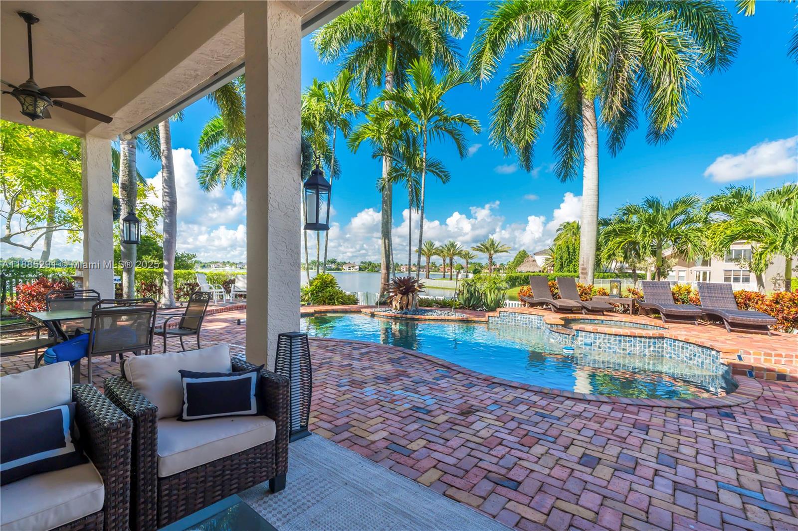 4166 Southwest 190th Avenue Miramar, FL 33029 - Photo 43 of 70 a view of swimming pool with outdoor seating