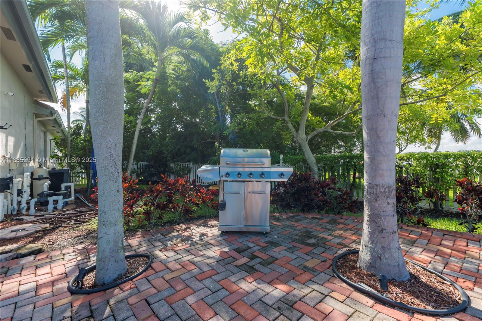 4166 Southwest 190th Avenue Miramar, FL 33029 - Photo 44 of 70 a view of a house with a garden