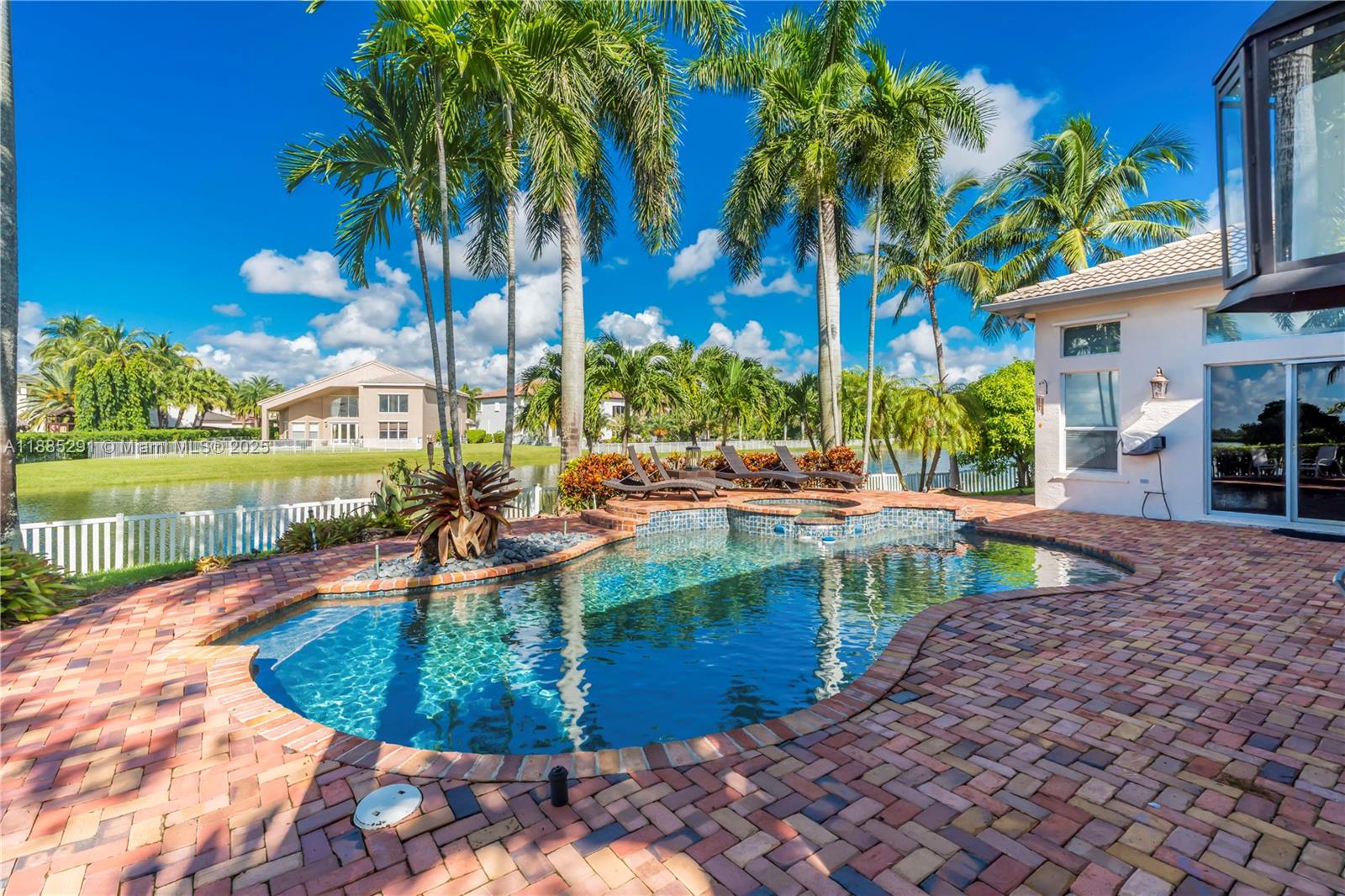 4166 Southwest 190th Avenue Miramar, FL 33029 - Photo 5 of 70 a view of a swimming pool with a patio