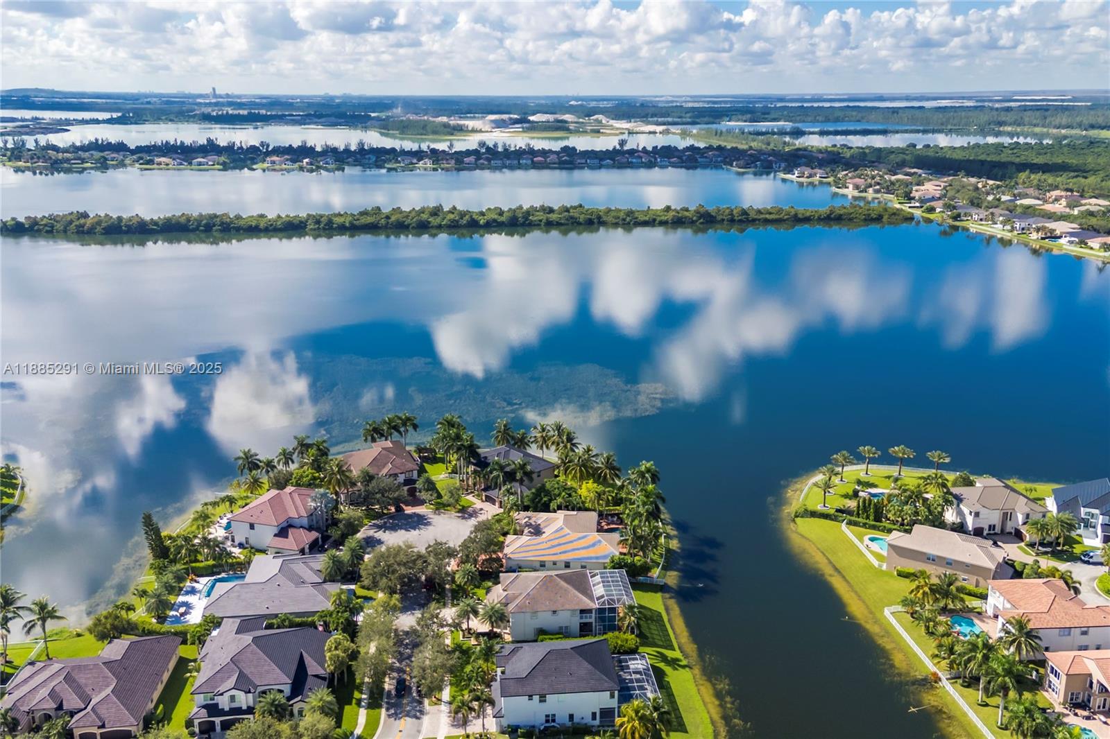 4166 Southwest 190th Avenue Miramar, FL 33029 - Photo 57 of 70 a view of a lake with a building in the background