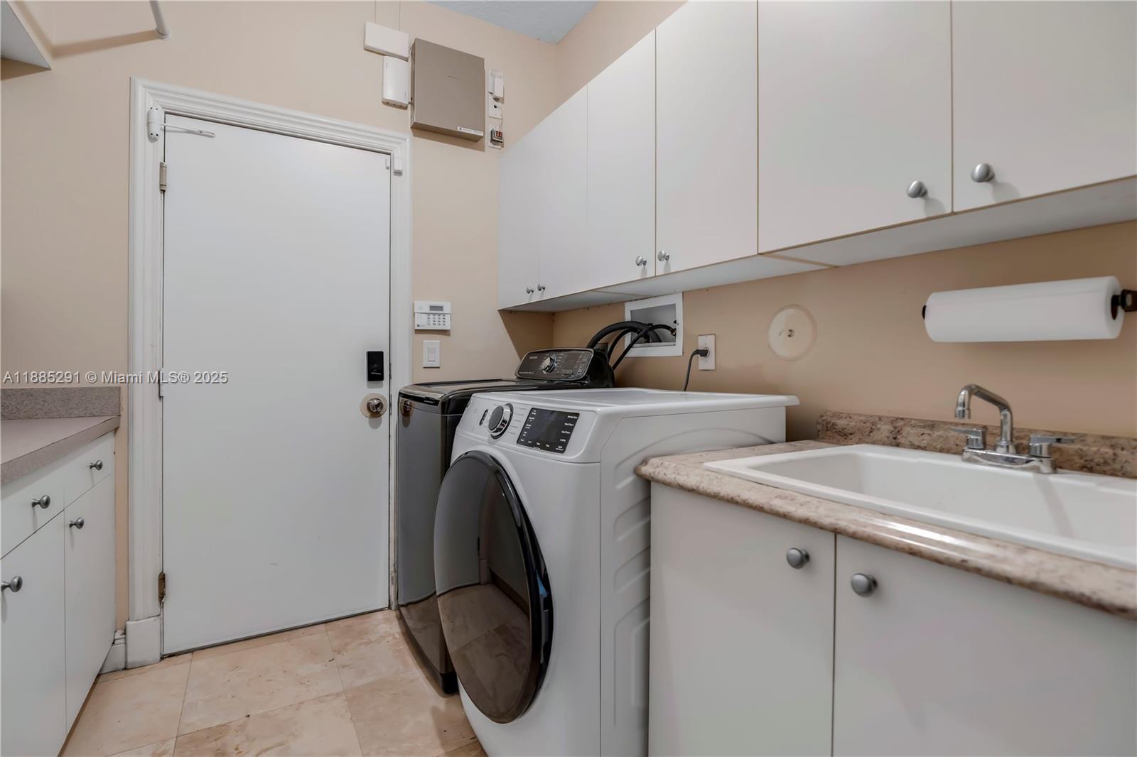4166 Southwest 190th Avenue Miramar, FL 33029 - Photo 70 of 70 a utility room with dryer and washer