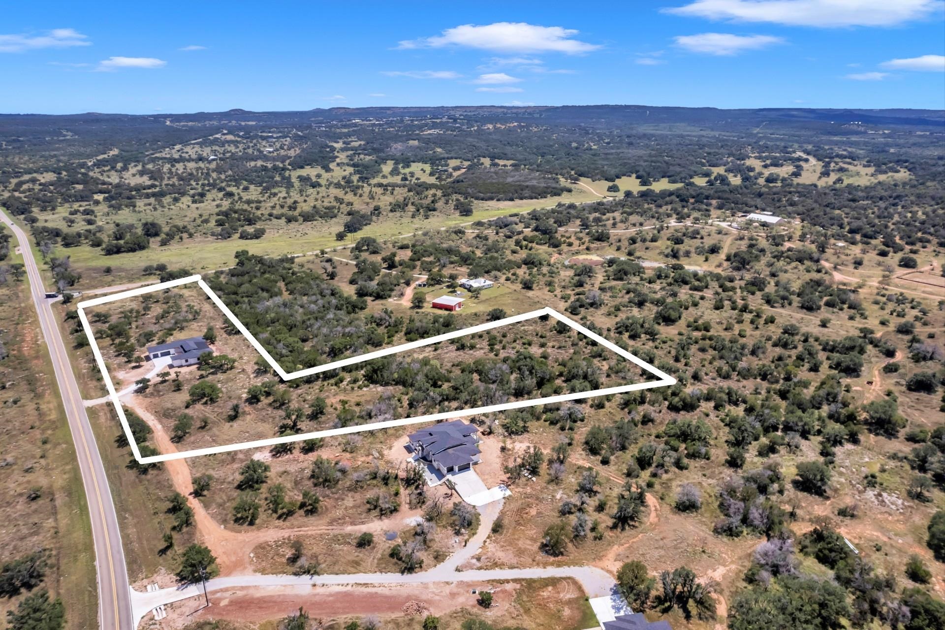 6425 Ranch Road 962 West Round Mountain, TX 78663 - Photo 25 of 30 an aerial view of multiple house