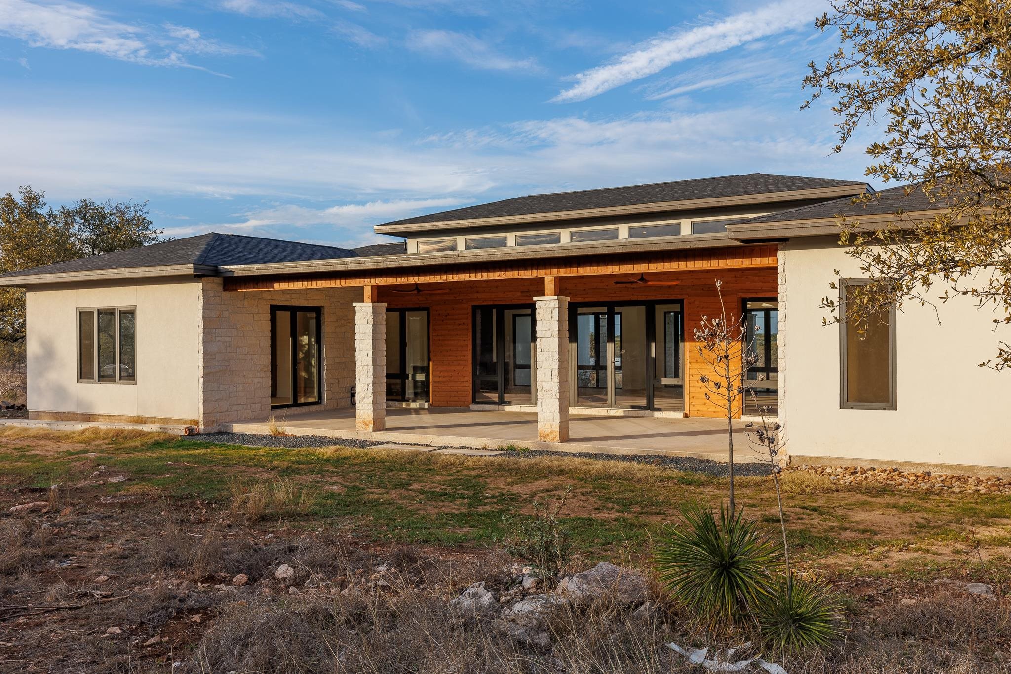 6425 Ranch Road 962 West Round Mountain, TX 78663 - Photo 4 of 30 front view of a house with a yard