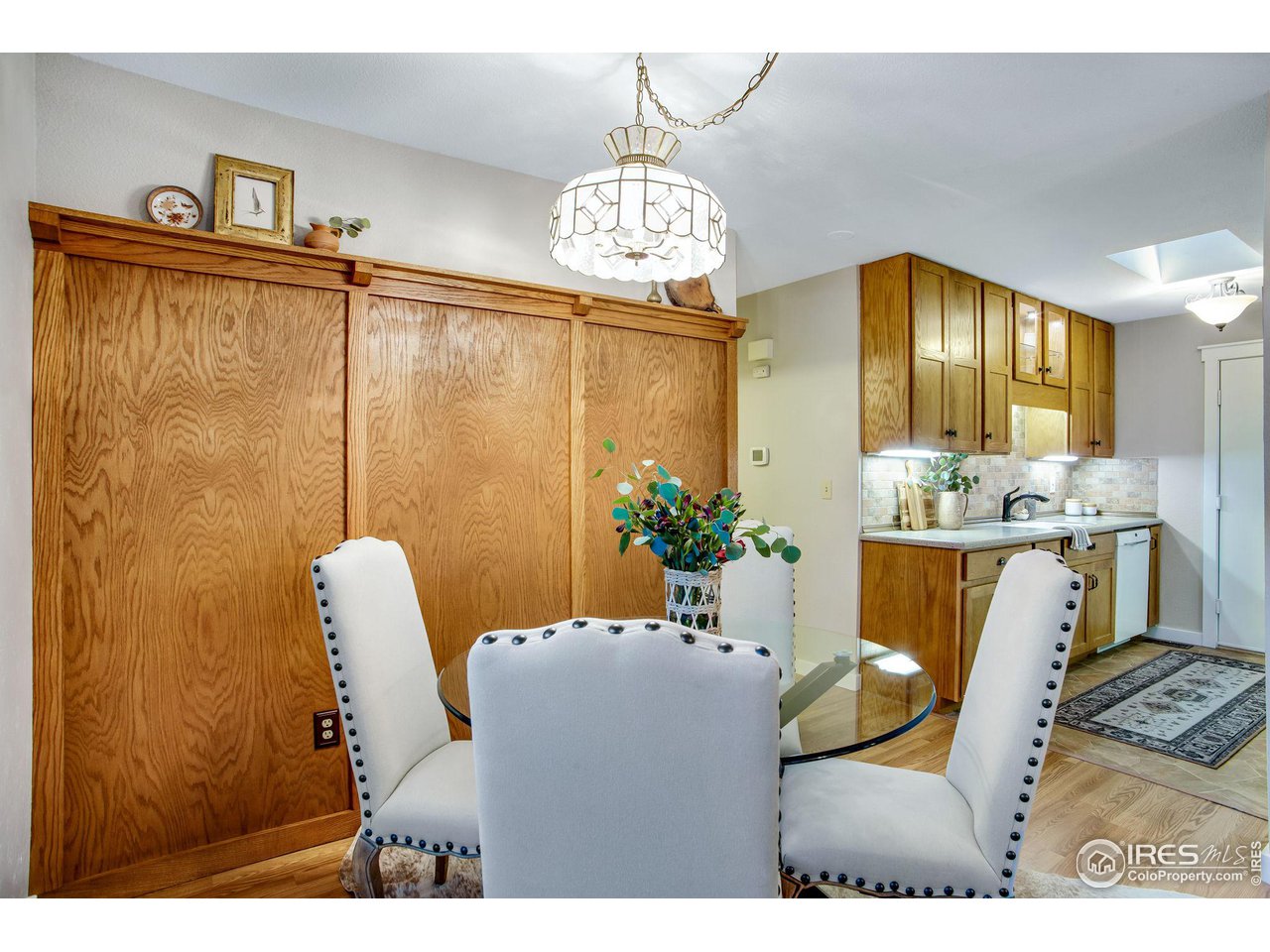 60 Lodgepole Drive Windsor, CO 80550 - Photo 11 of 27 a dining room with furniture and window