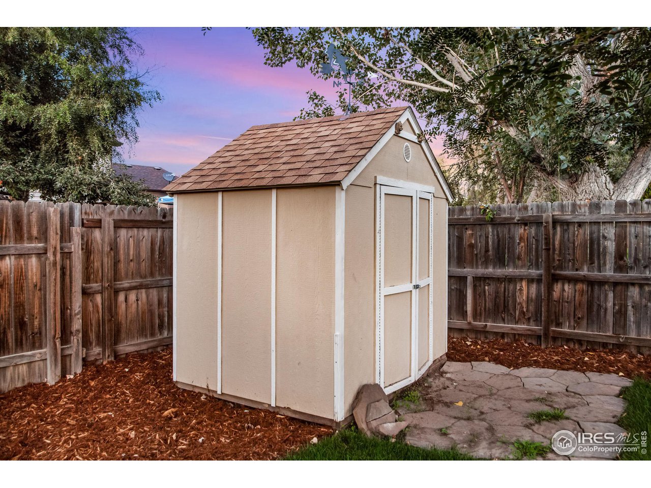 60 Lodgepole Drive Windsor, CO 80550 - Photo 27 of 27 a house view with a backyard space