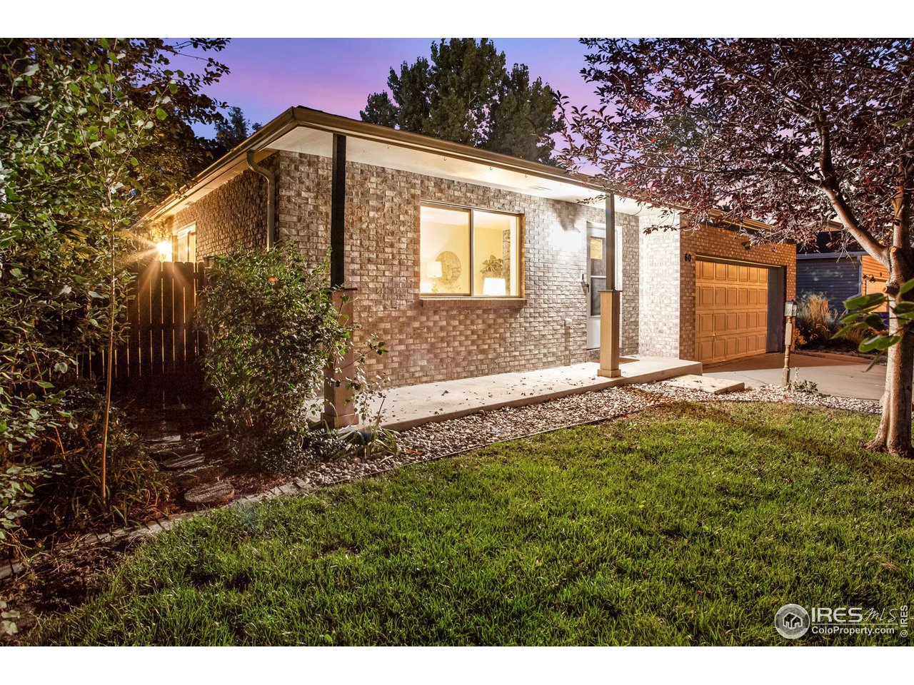 60 Lodgepole Drive Windsor, CO 80550 - Photo 3 of 27 a view of a house with a yard