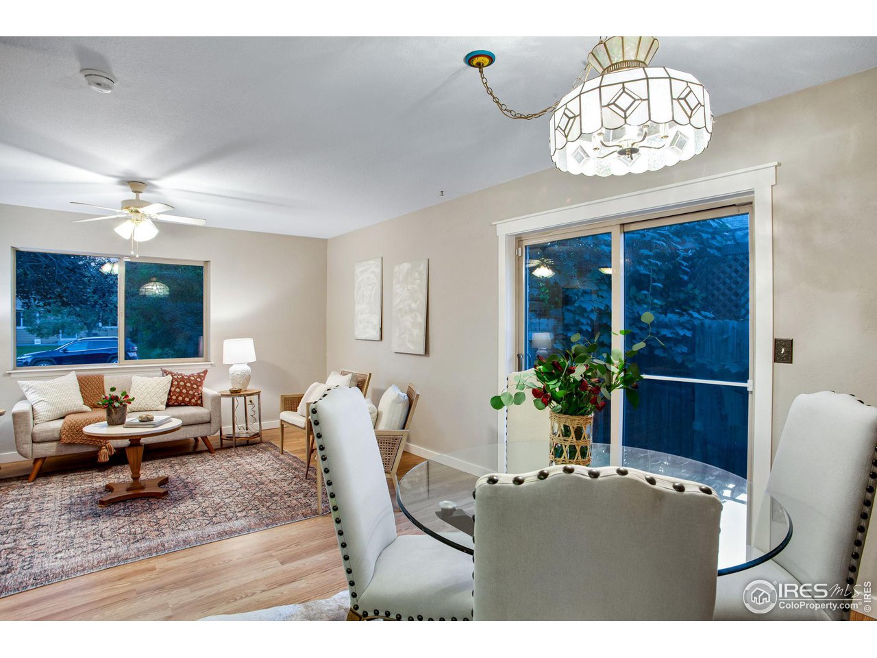 60 Lodgepole Drive Windsor, CO 80550 - Photo 10 of 27 a living room with furniture chandelier and a chandelier