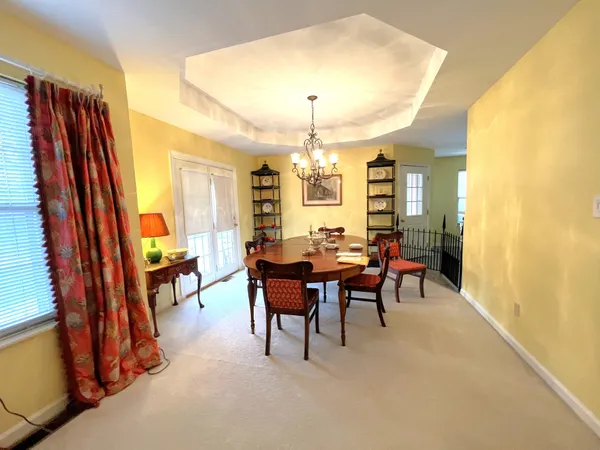 a view of a livingroom with furniture and window