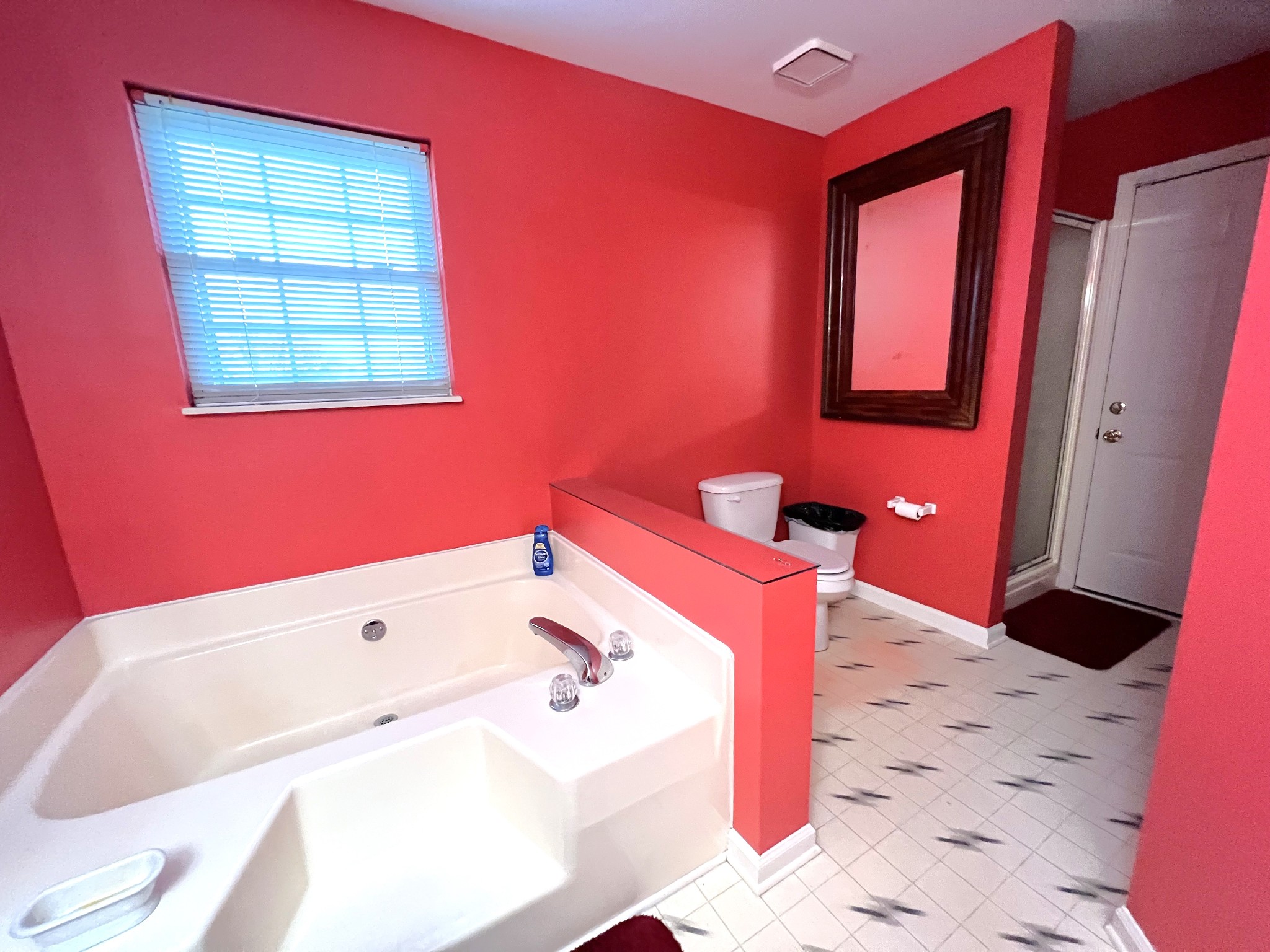 3639 Stone Valley Drive Hopkinsville, KY 42240 - Photo 9 of 17 a bathroom with a bathtub and a window