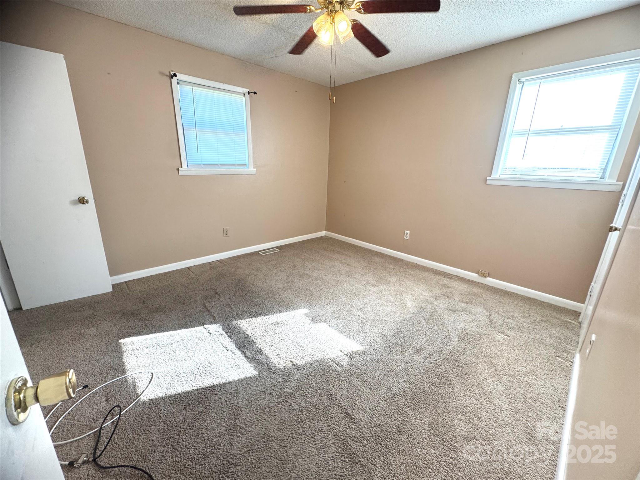 294 Mizpah Road Rockingham, NC 28379 - Photo 9 of 12 a view of an empty room with a window