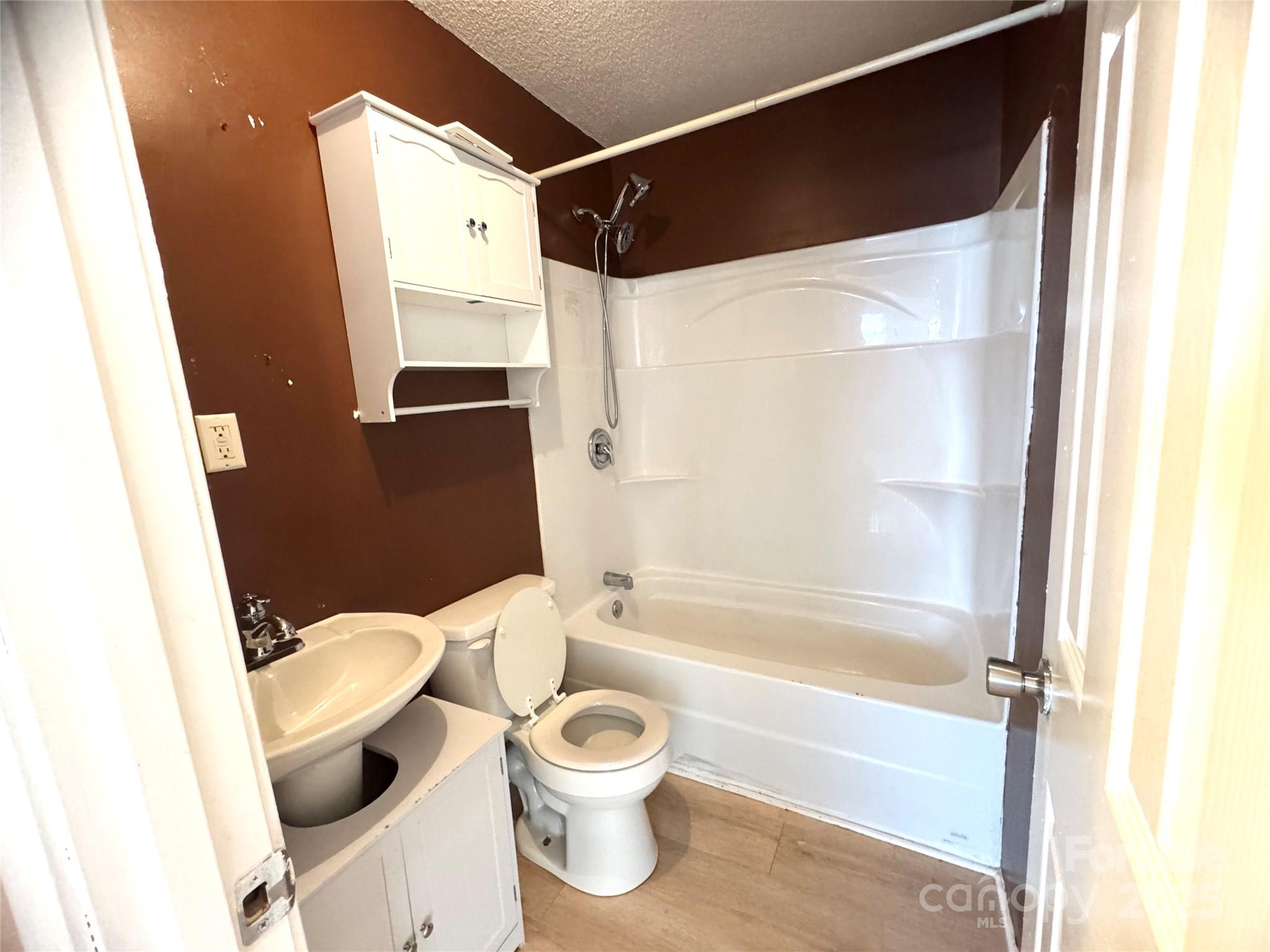 294 Mizpah Road Rockingham, NC 28379 - Photo 10 of 12 a bathroom with a toilet and a bathtub