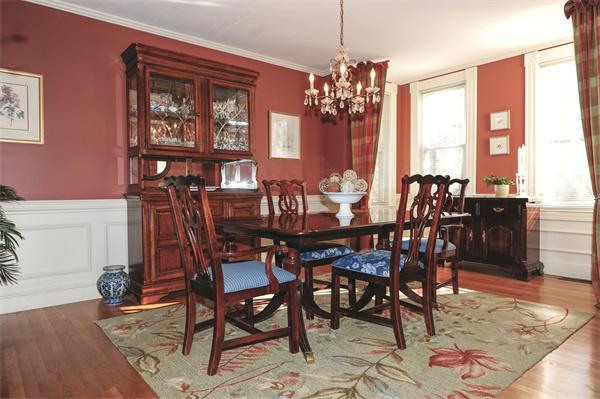 54 Boston Road, Unit A1 Chelmsford, MA 01824 - Photo 6 of 15 a view of a dining room with furniture window and wooden floor