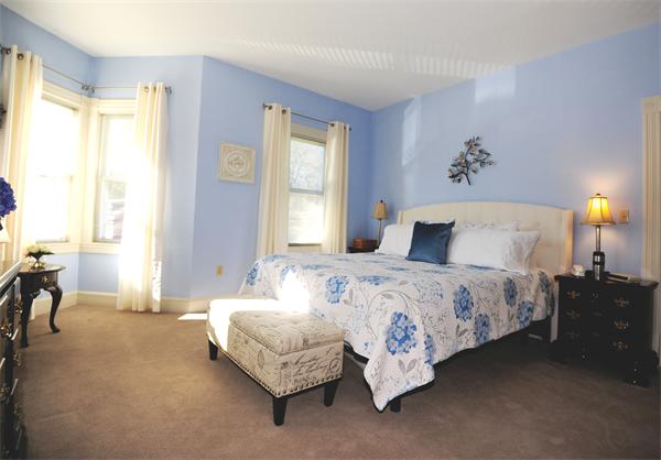 54 Boston Road, Unit A1 Chelmsford, MA 01824 - Photo 10 of 15 a bedroom with a bed and window