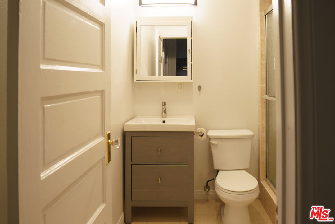 3210 Manitou Avenue Los Angeles, CA 90031 - Photo 13 of 26 a bathroom with a sink toilet and vanity