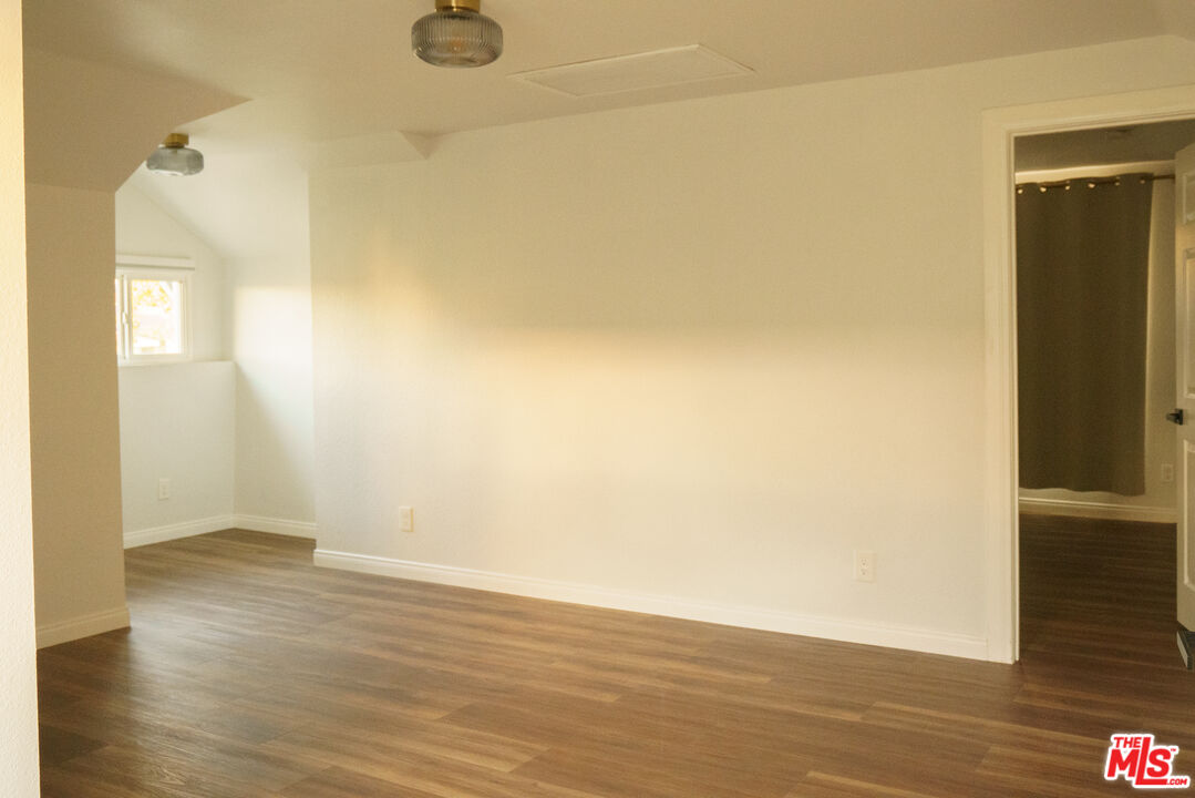 3210 Manitou Avenue Los Angeles, CA 90031 - Photo 17 of 26 a view of an empty room with wooden floor and a window