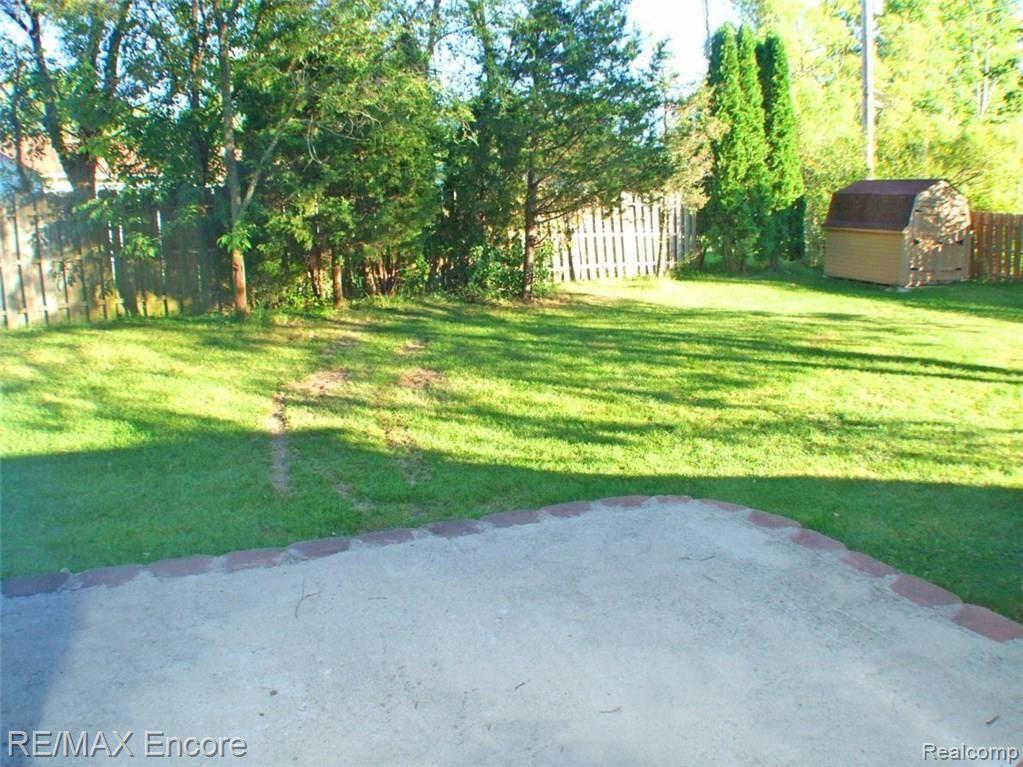 1747 Henbert Road West Bloomfield, MI 48324 - Photo 21 of 22 Great yard and shed for garden tools
