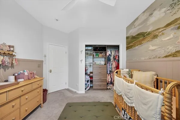 a view of a house with swimming pool and sitting area