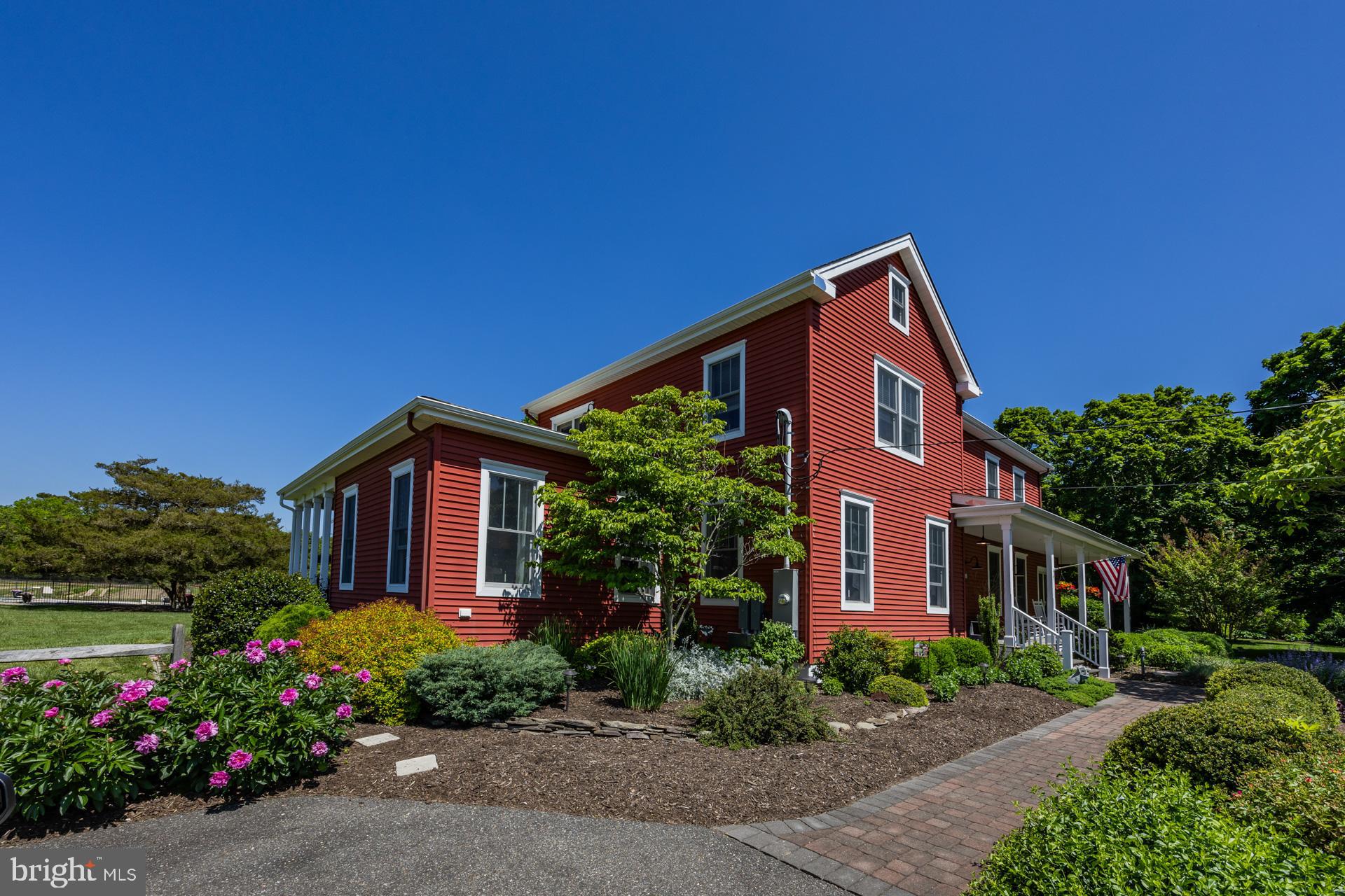 550 Hands Mill Road Woodbine, NJ 08270 - Photo 12 of 57 a front view of a house with a yard