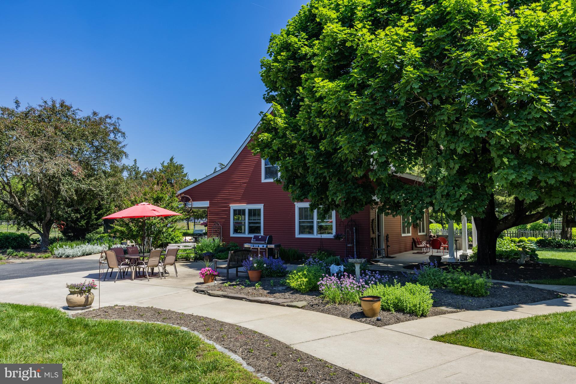 550 Hands Mill Road Woodbine, NJ 08270 - Photo 17 of 57 a front view of a house with garden